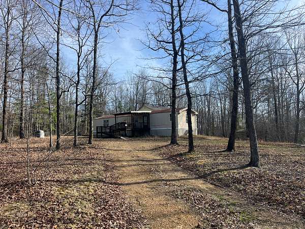 9 Acres of Land with Home for Sale in Waynesboro, Tennessee