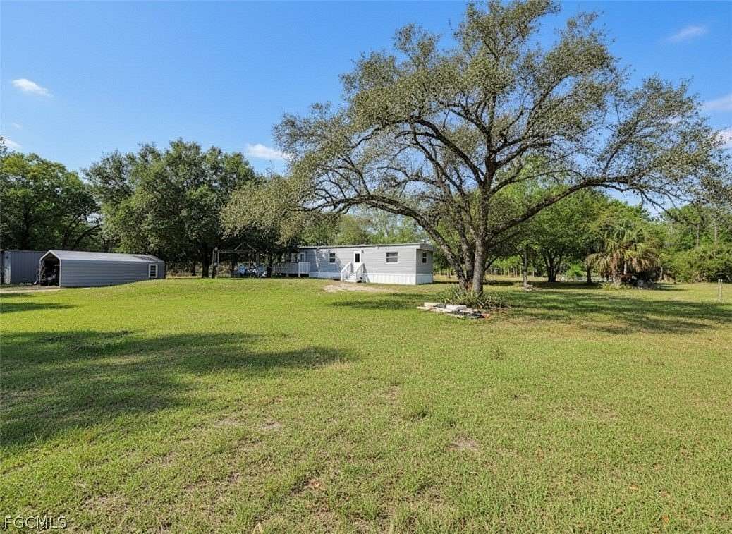 2.5 Acres of Land with Home for Sale in Clewiston, Florida