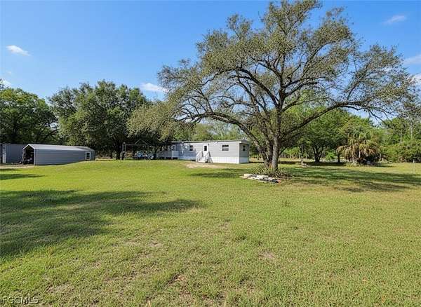 2.5 Acres of Land with Home for Sale in Clewiston, Florida