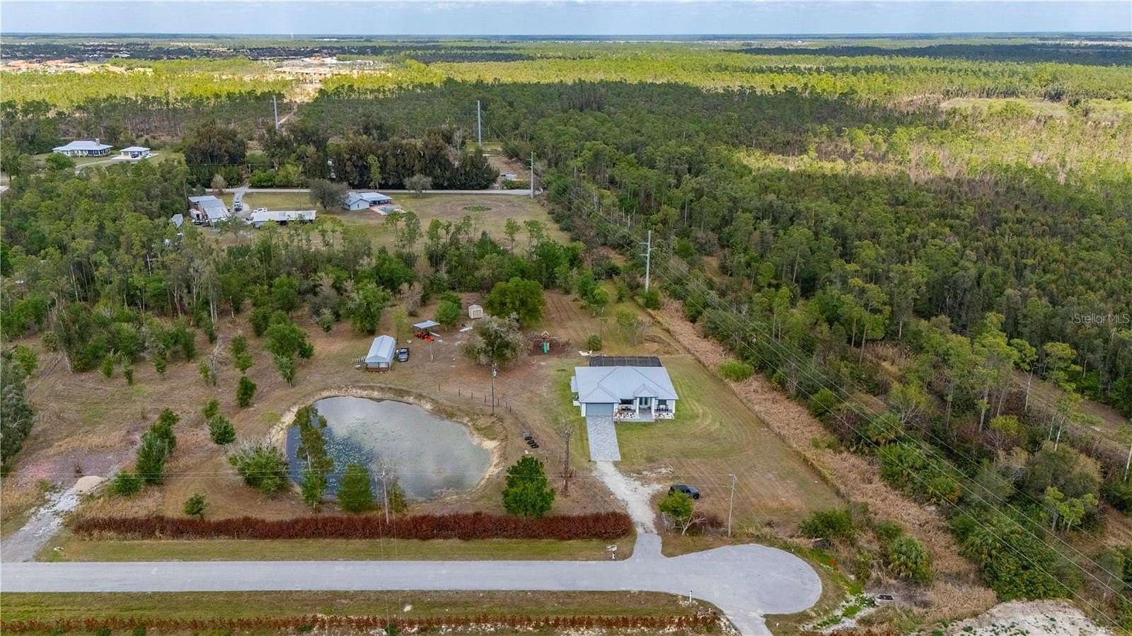 5.4 Acres of Land with Home for Sale in North Fort Myers, Florida
