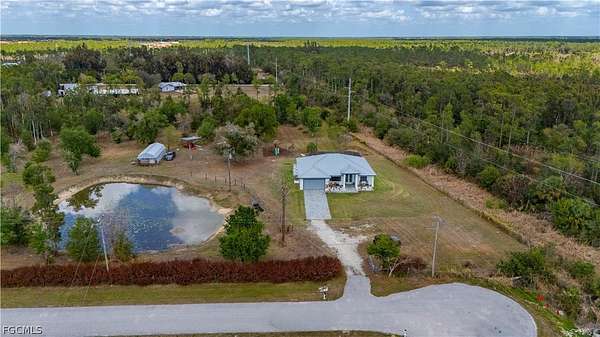 5.58 Acres of Land with Home for Sale in North Fort Myers, Florida