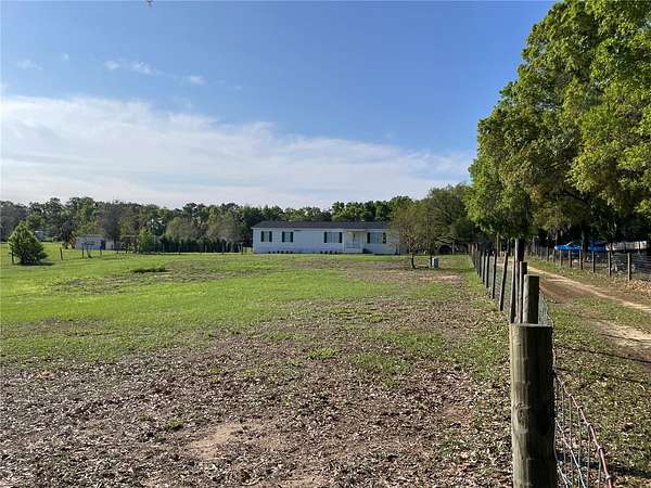2.4 Acres of Land with Home for Sale in Floral City, Florida