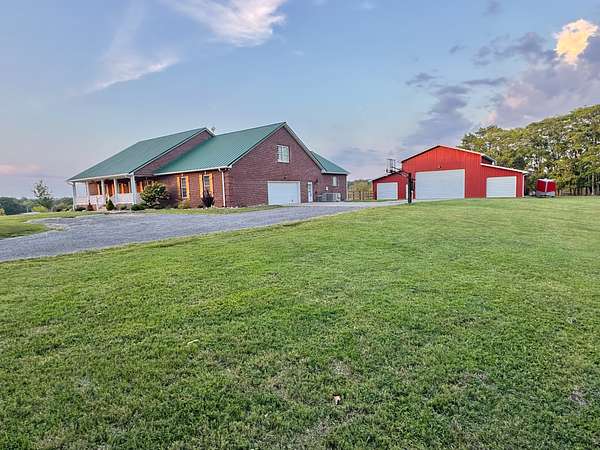 5 Acres of Land with Home for Sale in Burns, Tennessee