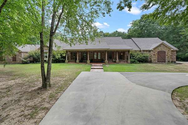 20.5 Acres of Recreational Land with Home for Sale in Carthage, Texas