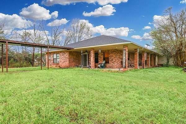 12.4 Acres of Land with Home for Sale in Groveton, Texas