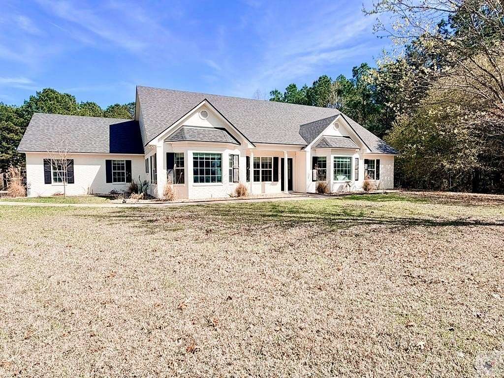 13 Acres of Land with Home for Sale in Atlanta, Texas