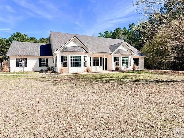 13 Acres of Land with Home for Sale in Atlanta, Texas