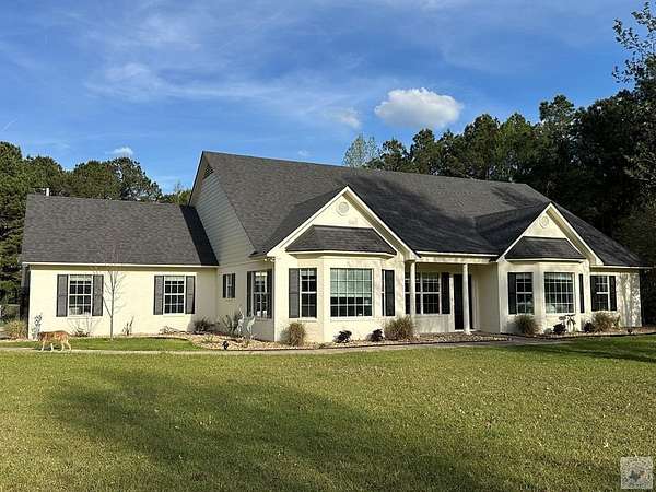 4.5 Acres of Land with Home for Sale in Atlanta, Texas