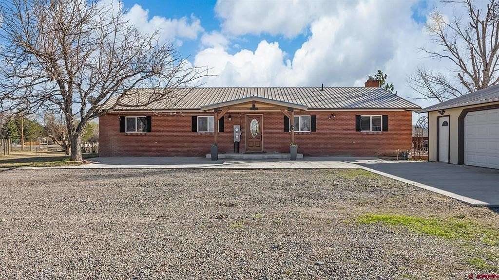 3.27 Acres of Land with Home for Sale in Montrose, Colorado