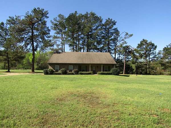 4.7 Acres of Land with Home for Sale in Joaquin, Texas