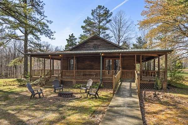 68.9 Acres of Recreational Land with Home for Sale in Centerville, Tennessee