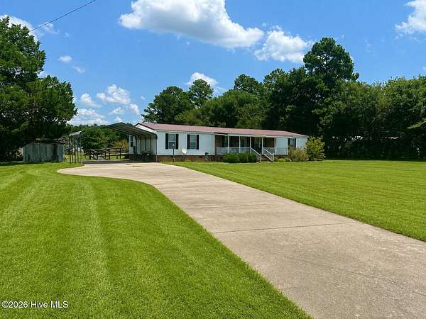 3.1 Acres of Land with Home for Sale in Evergreen, North Carolina