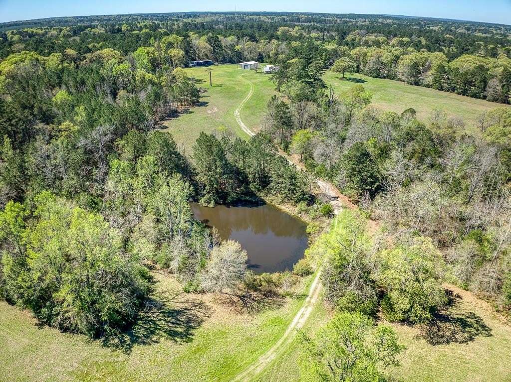 47.5 Acres of Land with Home for Sale in Elkhart, Texas