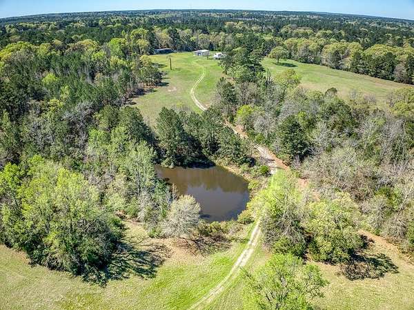 47.5 Acres of Land with Home for Sale in Elkhart, Texas