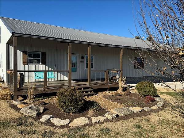 5.48 Acres of Land with Home for Sale in Berryville, Arkansas