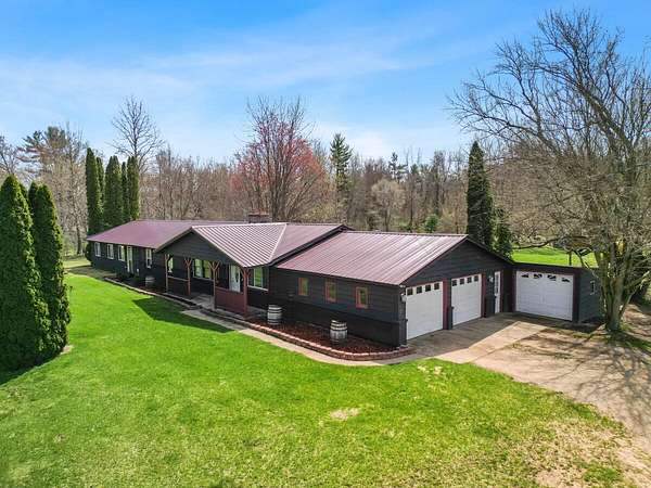 2 Acres of Land with Home for Sale in Grant, Michigan