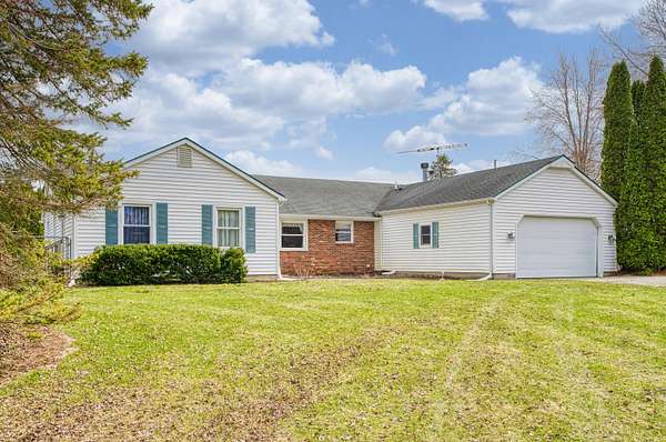 10 Acres of Land with Home for Sale in Chelsea, Michigan