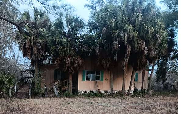 1.65 Acres of Land with Home for Auction in White Springs, Florida