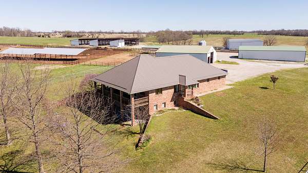 151 Acres of Agricultural Land with Home for Sale in Aurora, Missouri