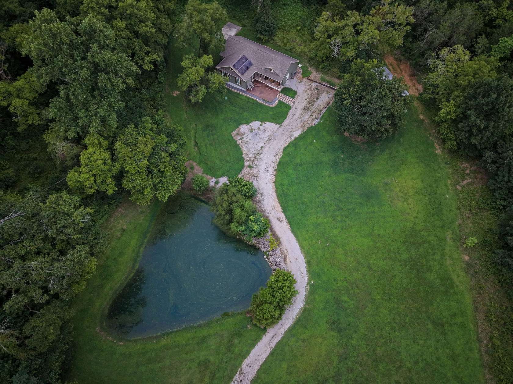 15.7 Acres of Recreational Land with Home for Sale in College Grove, Tennessee