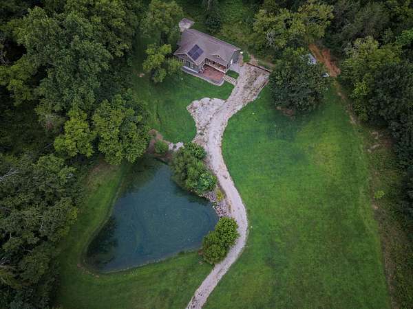 15.7 Acres of Recreational Land with Home for Sale in College Grove, Tennessee