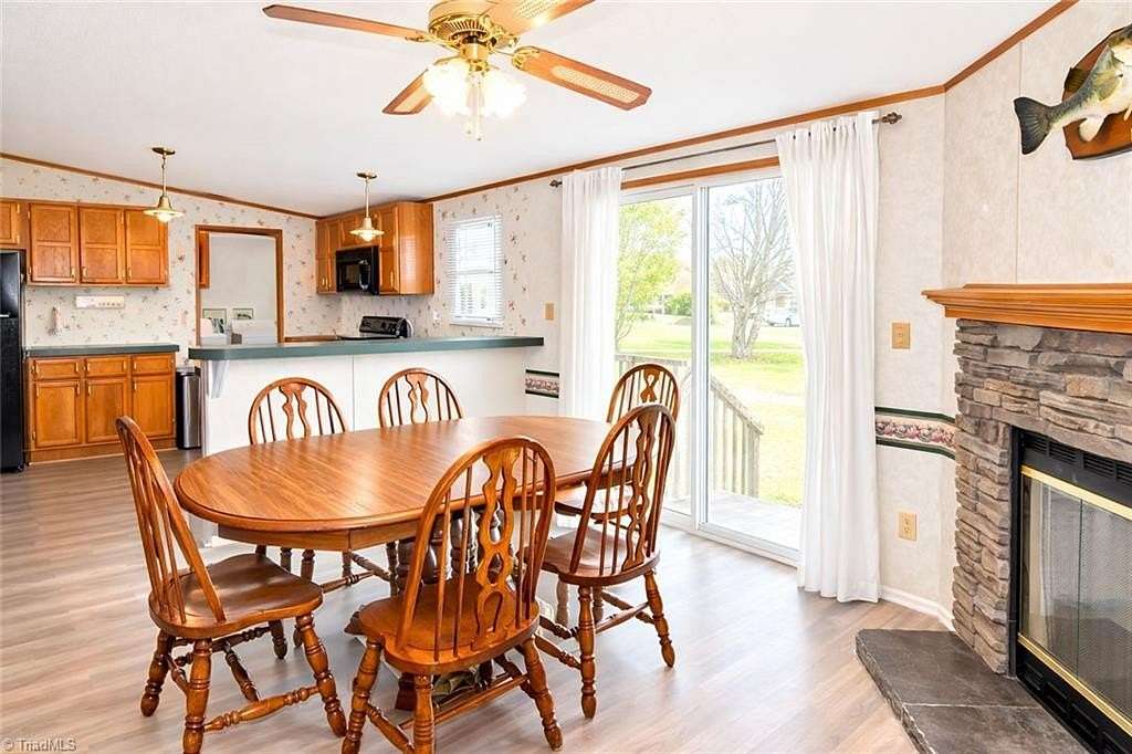 1.68 Acres of Land with Home for Sale in Oak Ridge, North Carolina