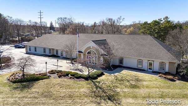 1.54 Acres of Improved Commercial Land for Sale in Comstock Park, Michigan