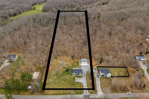 5 Acres of Land with Home for Sale in McEwen, Tennessee