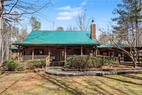 7.9 Acres of Land with Home for Sale in Whitesburg, Georgia
