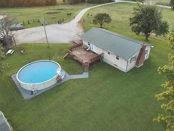 10 Acres of Land with Home for Sale in Clifton Hill, Missouri