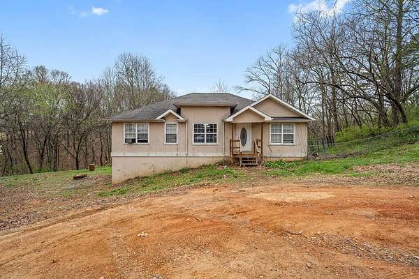 9.48 Acres of Land with Home for Sale in Rossville, Georgia