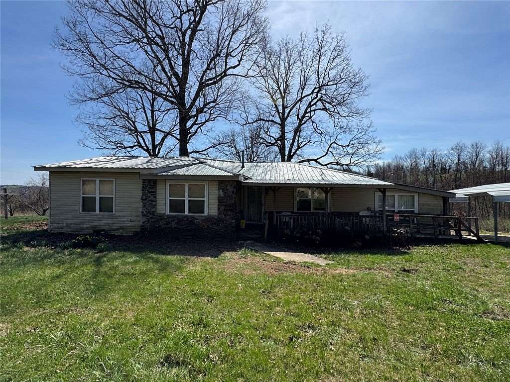 12.6 Acres of Land with Home for Sale in Sand Gap, Arkansas