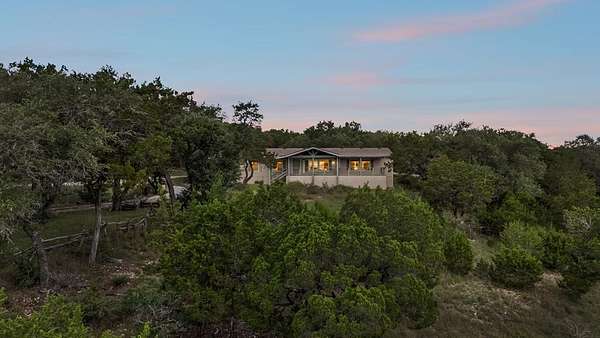 10.9 Acres of Land with Home for Sale in Canyon Lake, Texas