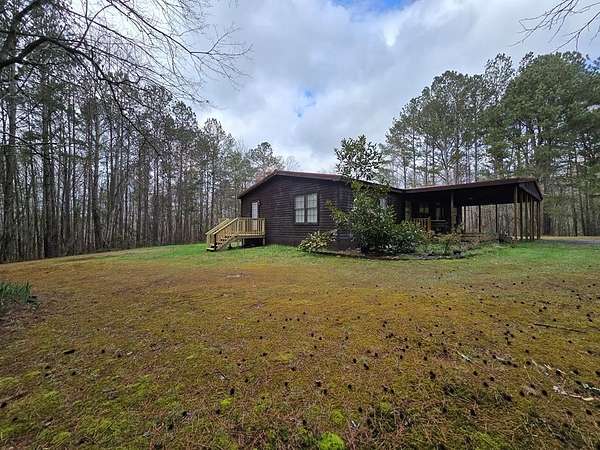 6.15 Acres of Land with Home for Sale in Rocky Face, Georgia
