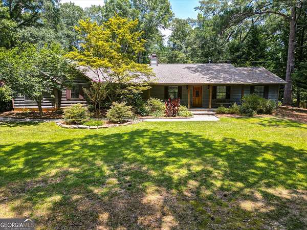 8.29 Acres of Land with Home for Sale in Hampton, Georgia