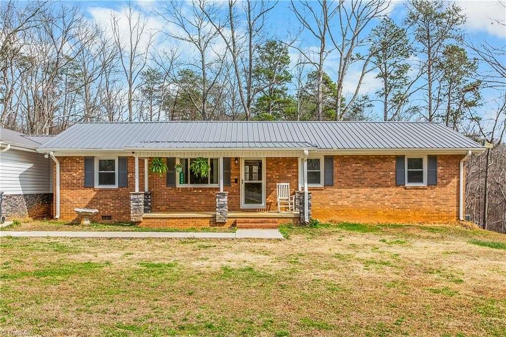 1.89 Acres of Land with Home for Sale in Sandy Ridge, North Carolina