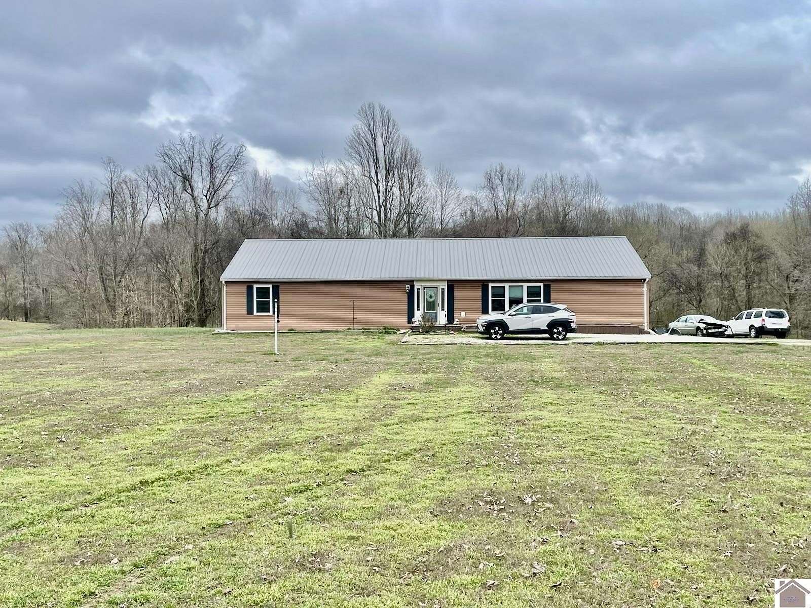 3.5 Acres of Land with Home for Sale in Arlington, Kentucky