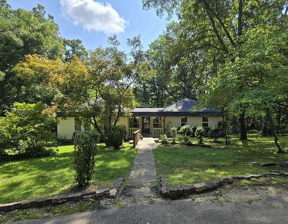 10 Acres of Recreational Land with Home for Sale in Somerville, Tennessee