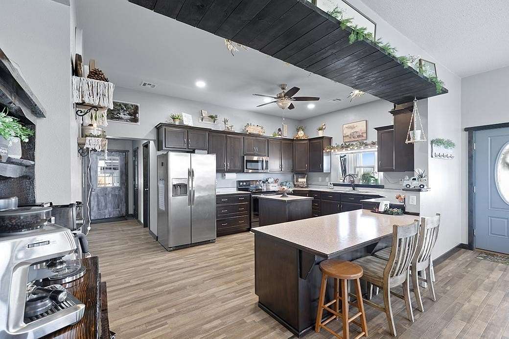 2.46 Acres of Land with Home for Sale in La Russell, Missouri