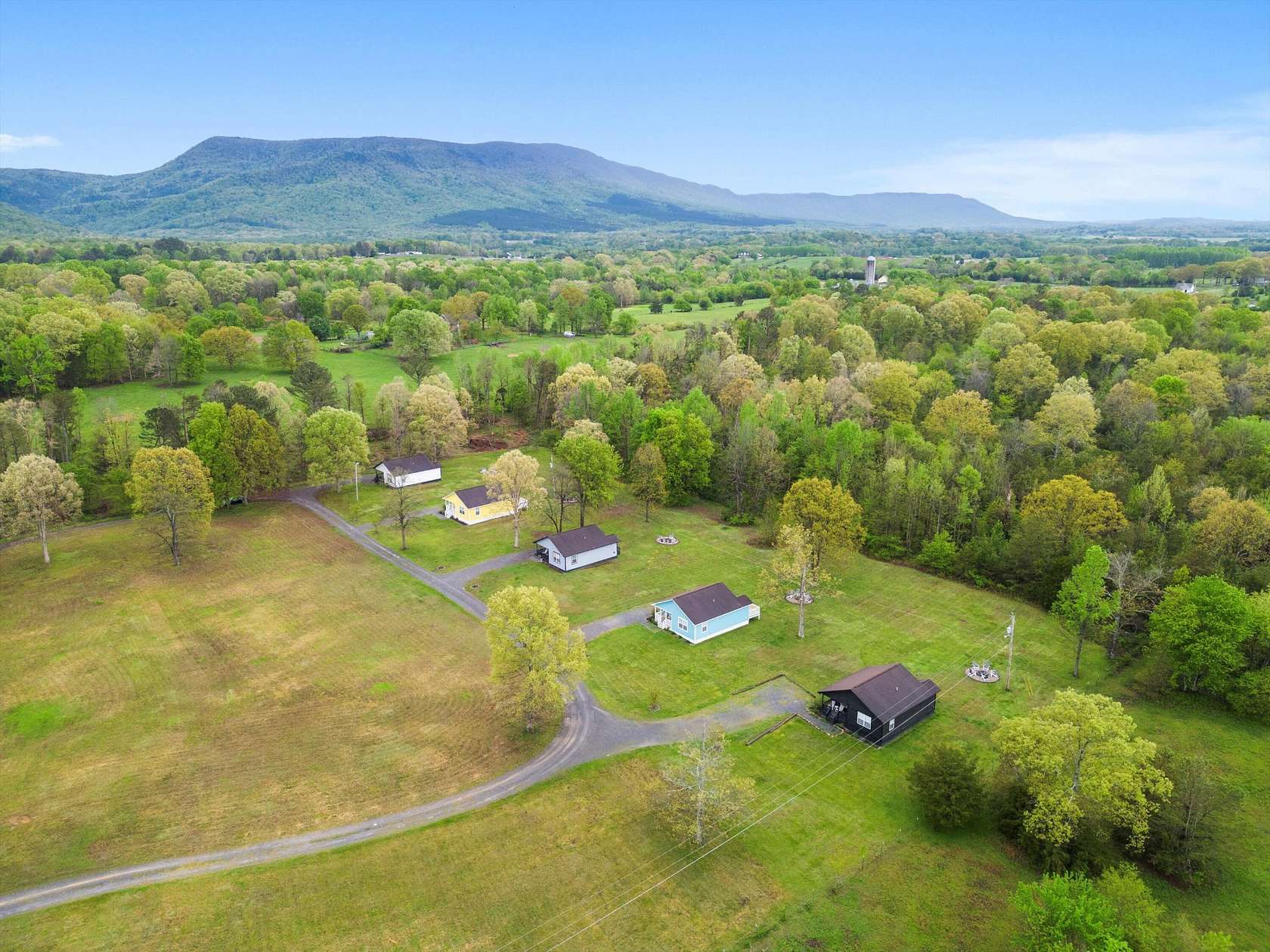 10 Acres of Land with Home for Sale in Delano, Tennessee