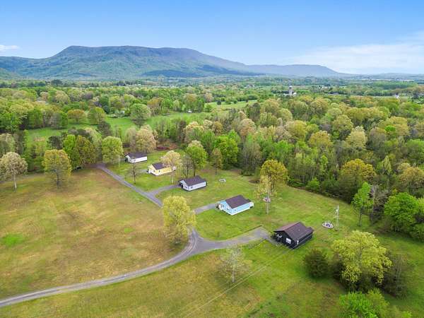 10 Acres of Land with Home for Sale in Delano, Tennessee