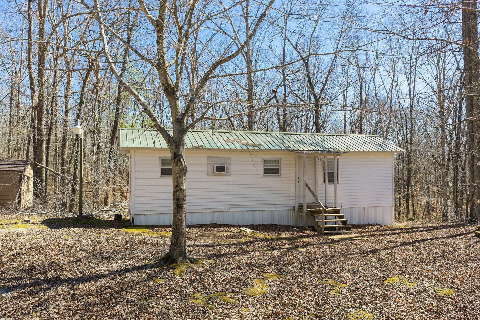 5.29 Acres of Land with Home for Sale in Bath Springs, Tennessee