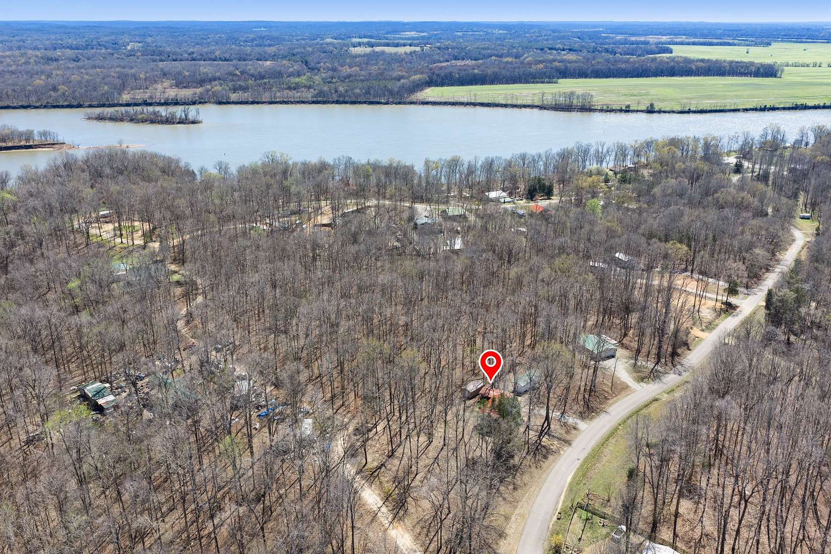 5.29 Acres of Land with Home for Sale in Bath Springs, Tennessee