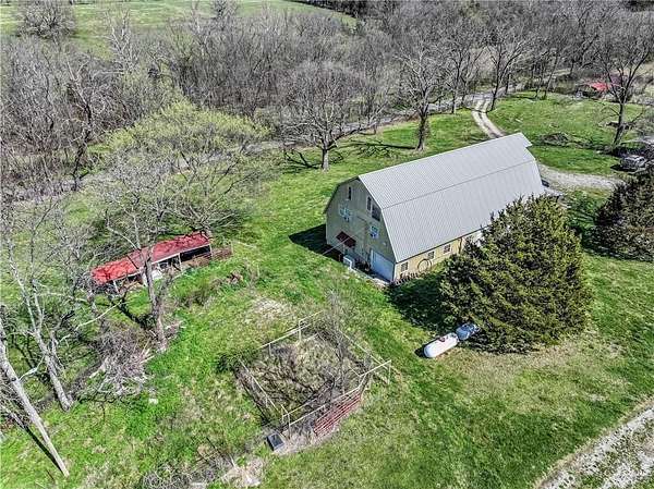 10 Acres of Land with Home for Sale in Berryville, Arkansas