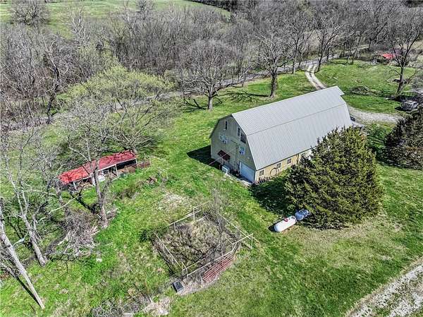 10 Acres of Land with Home for Sale in Berryville, Arkansas