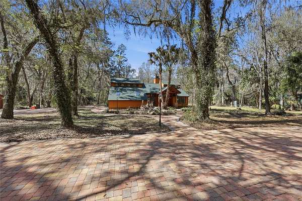 6.48 Acres of Land with Home for Sale in Micanopy, Florida