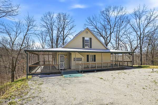 10 Acres of Recreational Land with Home for Sale in Noel, Missouri