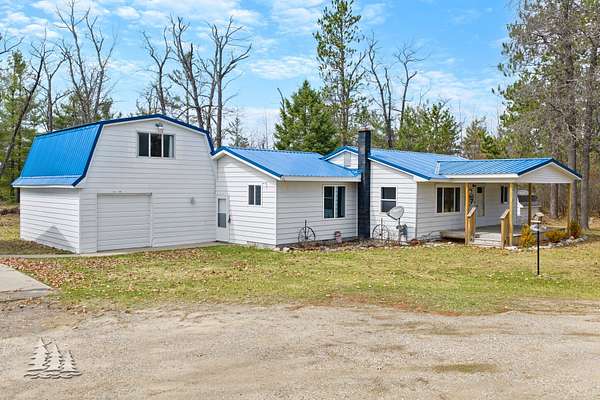 10 Acres of Recreational Land with Home for Sale in Lewiston, Michigan