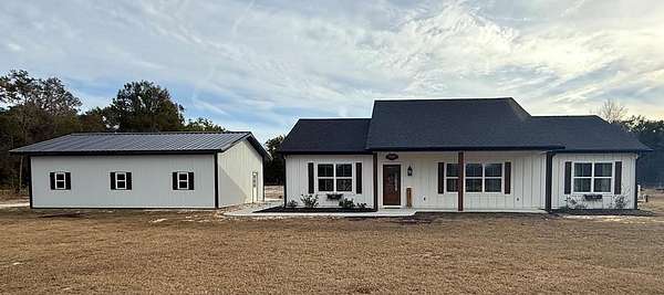 4.38 Acres of Land with Home for Sale in Chiefland, Florida