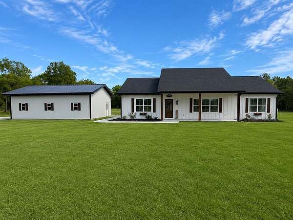 4.38 Acres of Land with Home for Sale in Chiefland, Florida